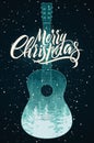 Merry Christmas. Calligraphic retro Christmas card or poster design with forest winter landscape inside silhouette acoustic guitar Royalty Free Stock Photo